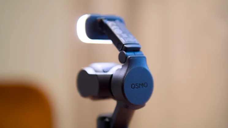 A rear view of the DJI OSMO Pocket 4 with fill light attached