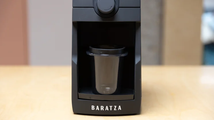 The Baratza Encore ESP Pro coffee grinder with single dose cup inserted