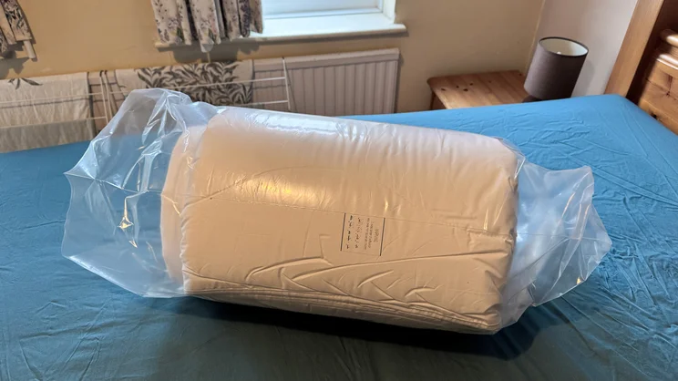 The Dorma Full Forever duvet sealed in its bag, on a mattress