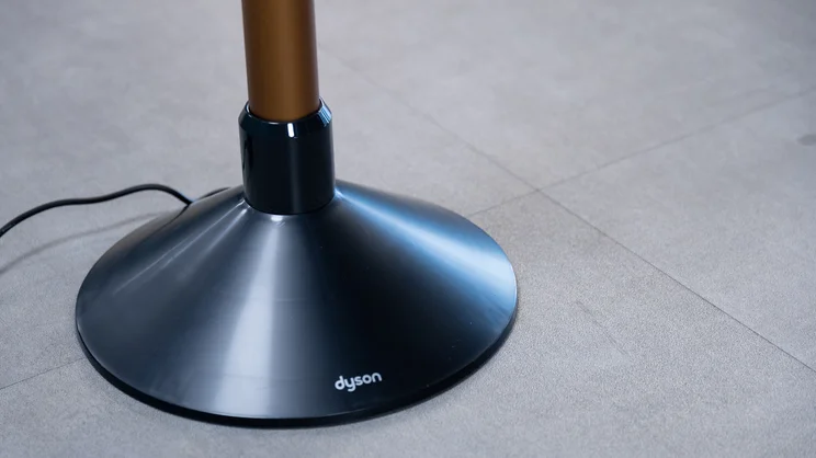 A closeup of the Dyson PencilWash hard floor cleaner's charging stand