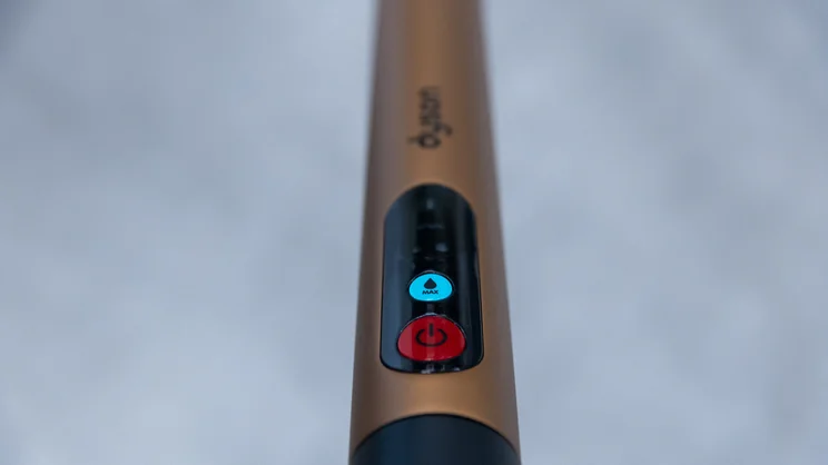 A closeup of the Dyson PencilWash's handle and controls