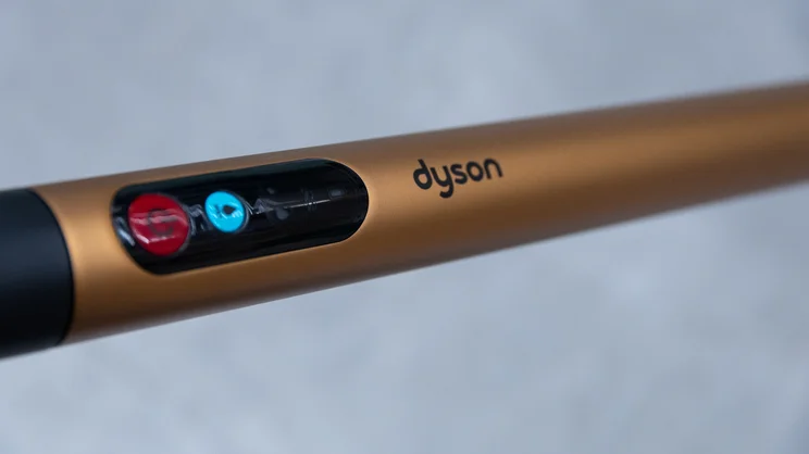 A closeup of the Dyson PencilWash's handle and controls