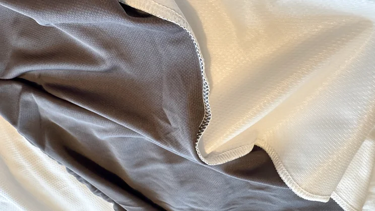 A closeup of the underside and edge seam of the Emma Mattress Protector
