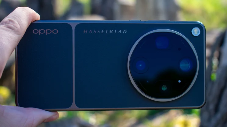 Oppo Find X9 Ultra in hand, rear view, landscape orientation