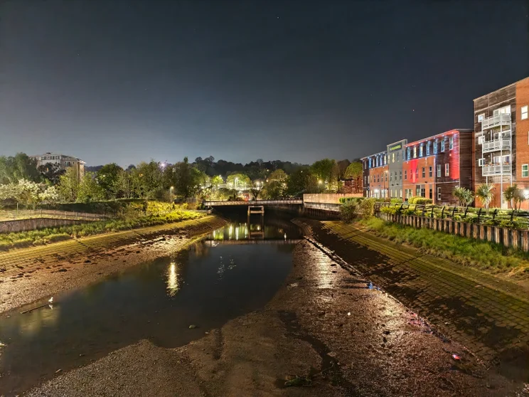 A river at low tide at night
