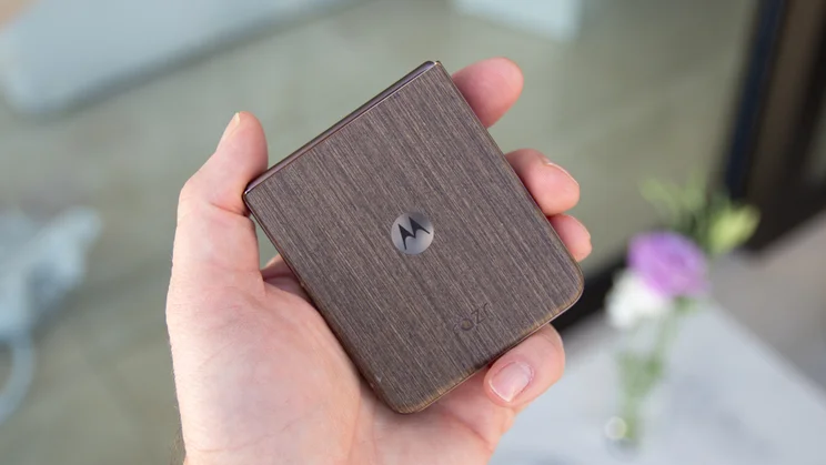 Razr 70 Ultra folded in hand, rear view