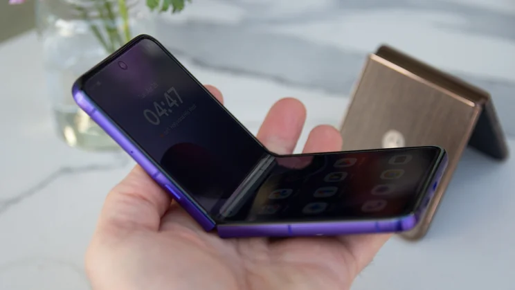 Razr 70 Ultra partially unfolded in hand