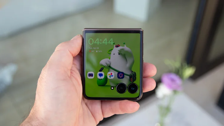 Razr 70 Ultra folded in hand, external display on