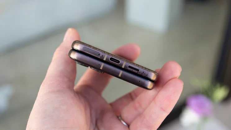 Razr 70 Ultra folded in hand, bottom view