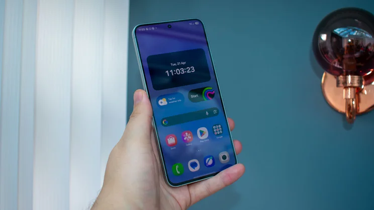 Samsung Galaxy A57 in hand, front view