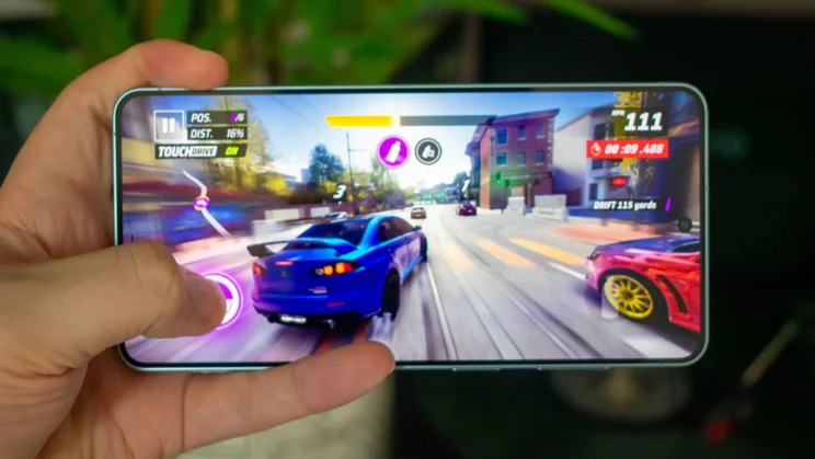 Samsung Galaxy S26 Plus in hand, displaying a mobile game