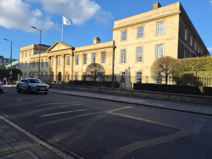 A large building next to a road