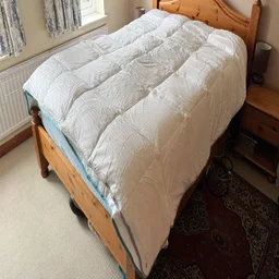 The Simba 3-in-1 duvet on a bed in a bedroom