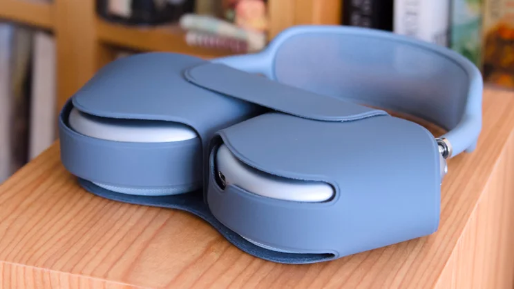 The Apple AirPods Max 2 in blue, in their case