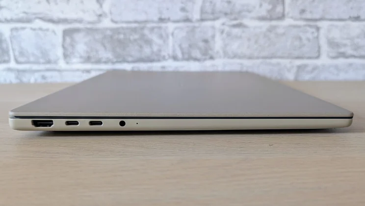 The Asus Zenbook A16, closed, pictured from the left side