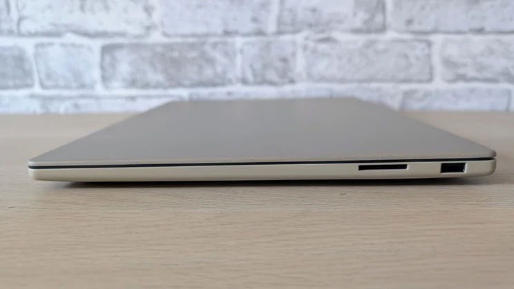 The Asus Zenbook A16, closed, pictured from the right side