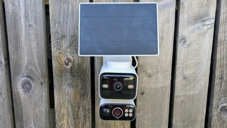 The Tapo C645D mounted on a fence, pictured from in front