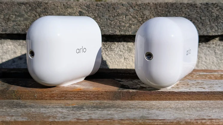 Two Arlo Ultra 3 security cameras, pictured from the rear