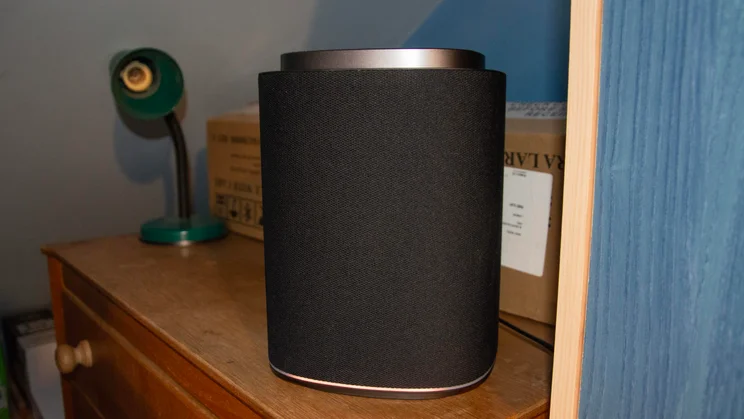 An LG Sound Suite M7 speaker on top of a chest of drawers