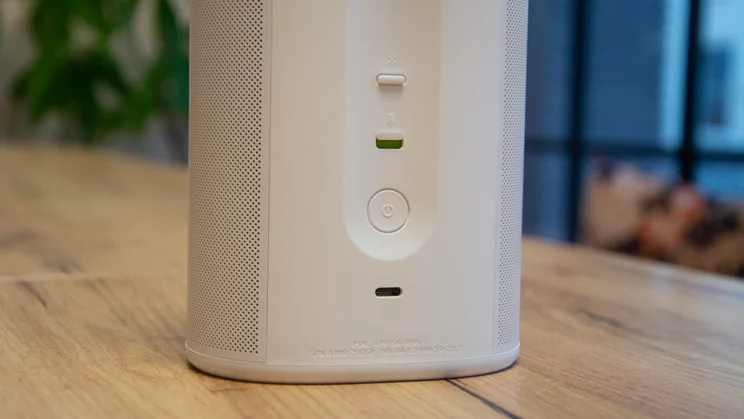 Close-up of the pairing and power buttons and microphone switch on the rear of the white Sonos Play speaker