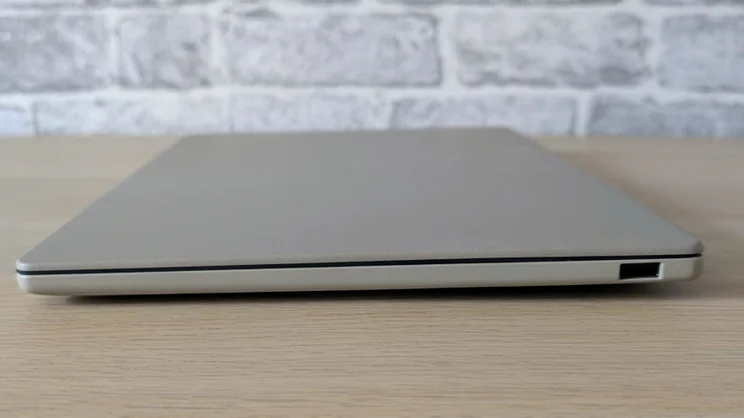 Asus Zenbook A14 (2026) closed pictured from the right edge