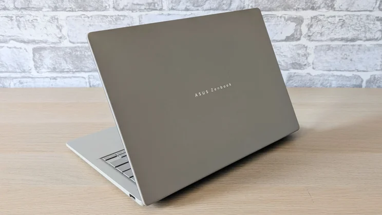 Asus Zenbook A14 (2026) half open pictured from the rear right quarter