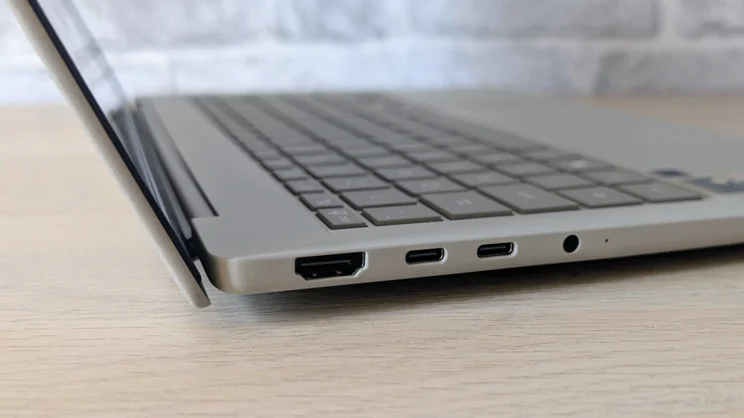 Asus Zenbook A14 (2026), open, pictured from the left edge