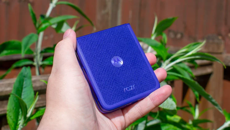 Motorola Razr 70 Ultra folded in hand, rear view