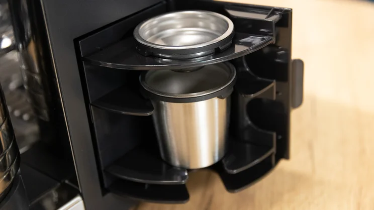 The Ninja Luxe Cafe Pro's basket compartment, open with two baskets inside