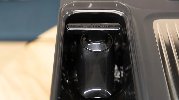 A closeup of the Ninja Luxe Cafe Pro espresso machine's bean hopper with lid removed