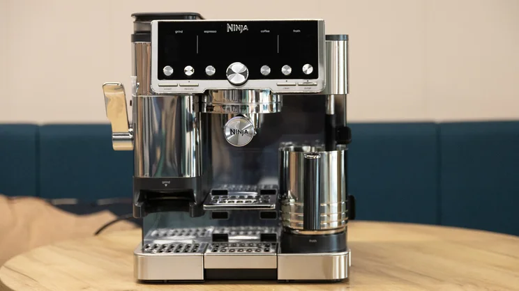 The Ninja Luxe Cafe Pro espresso machine on a table in an office
