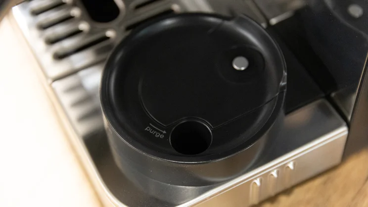 A closeup of the Ninja Luxe Cafe Pro espresso machine's milk steaming base