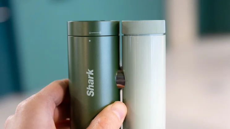The Shark ChillPill portable fan, held upright