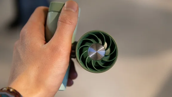 The Shark ChillPill portable fan, held with fan facing the camera