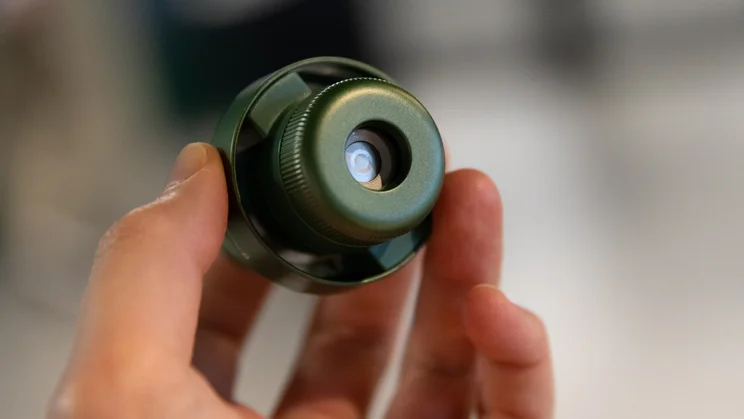 The Shark ChillPill portable fan's misting pod held up to the camera
