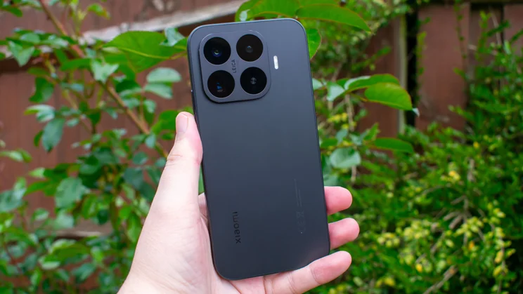 Xiaomi 17T in hand, rear view