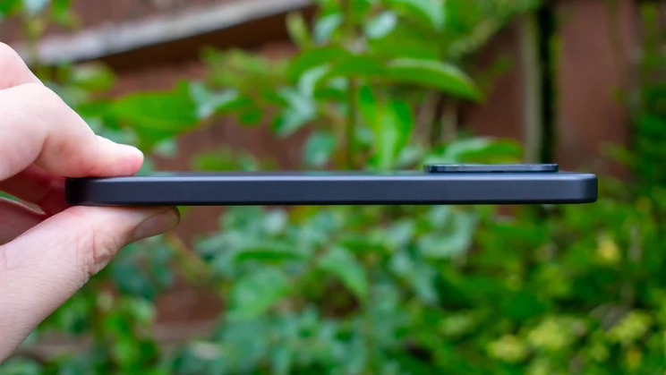 Xiaomi 17T in hand, side view