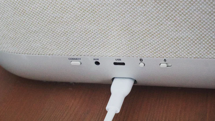 Rear view of the Denon Home 400 wireless speaker showing the connection ports and buttons