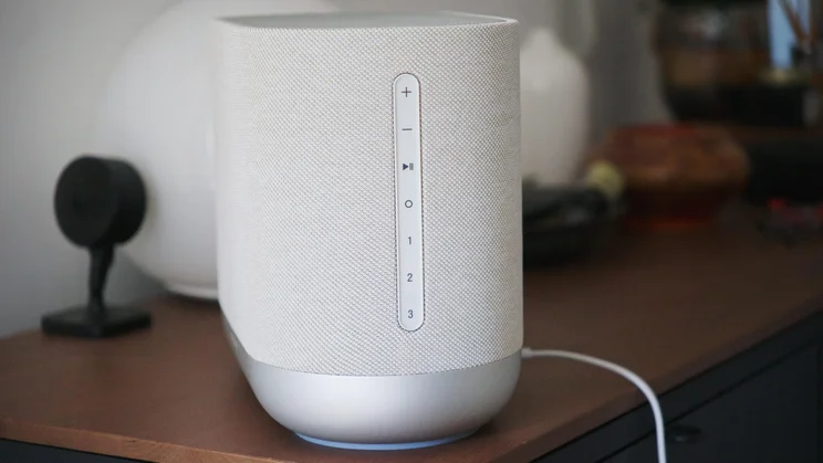 Side view of the Denon Home 400 wireless speaker showing the control buttons