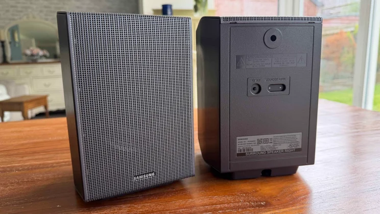 The Samsung HW-Q990H rear speakers side by side showing the front of one and the back of the other