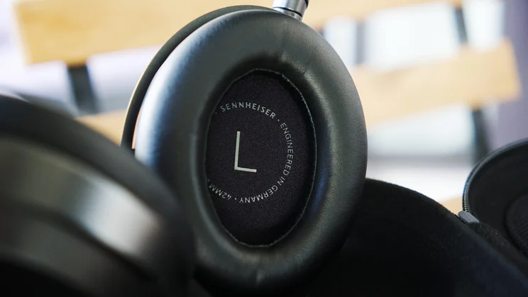 The inside of the left earcup of the Sennheiser Momentum 5 Wireless over-ear headphones