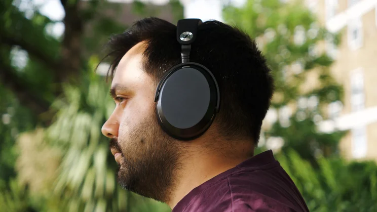 Side view of the Sennheiser Momentum 5 Wireless over-ear headphones being worn by our reviewer