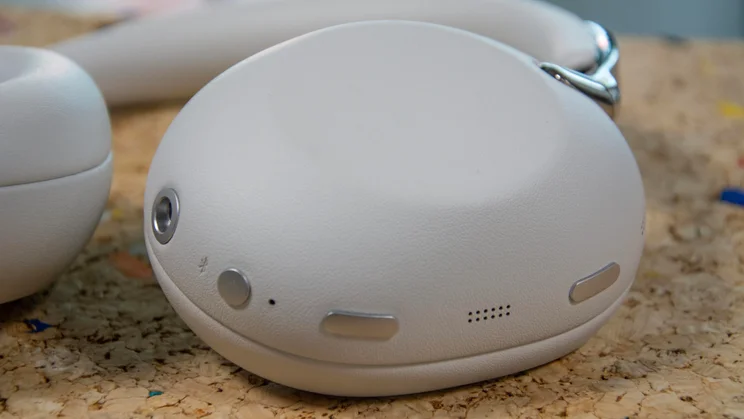 The left earcup of the Sony 1000X The Collexion over-ear headphones showing the power, NC/AMB and Listening mode buttons as well as the AUX port
