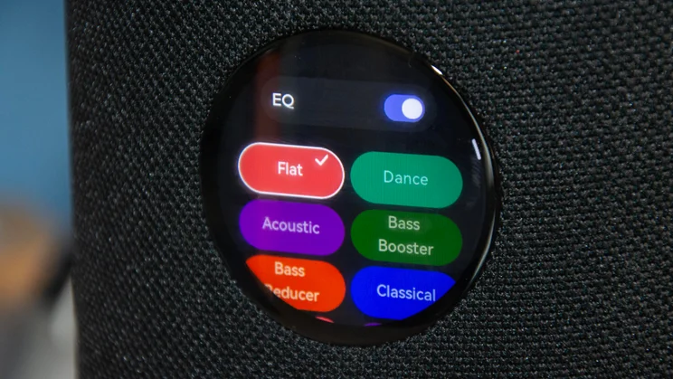 The digital display on the WiiM Sound wireless speaker showing the EQ options