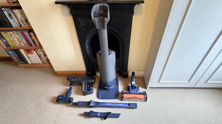 A picture of the Shark PowerDetect Speed Clean and Empty Pet Pro with its attachments and docking station