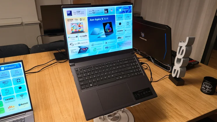 Acer Aspire X 16 AI laptop on a stand