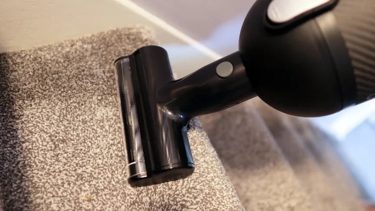 Cleaning the stairs with the Halo Capsule XR vacuum cleaner