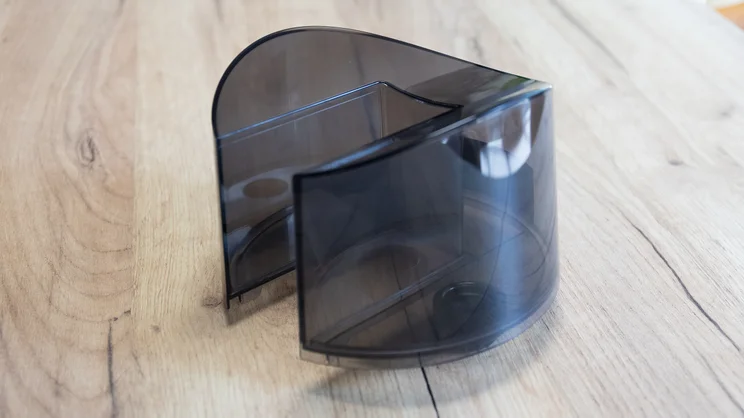 The Dreo TurboCool Misting Fan 516S's water tank on an office table