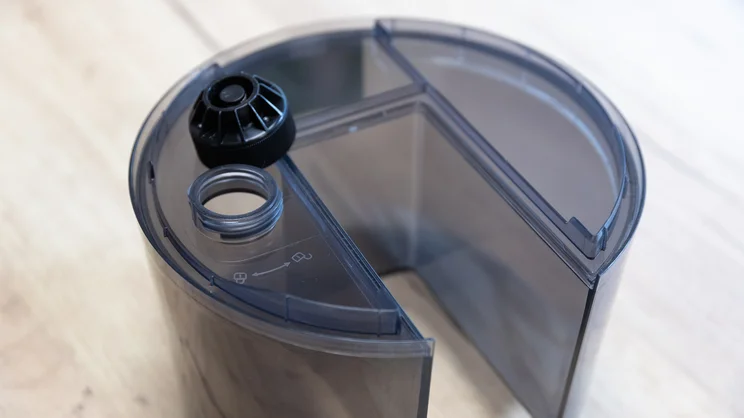 The Dreo TurboCool Misting Fan 516S's water tank on an office table