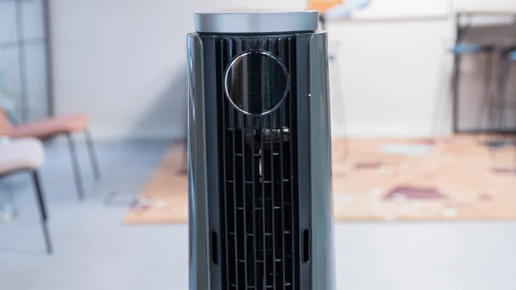 A closeup of the top of the Dreo TurboCool Misting Fan 765S. Its digital display is off